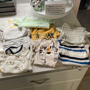 Newborn and 0-3 month onesies wore only once!